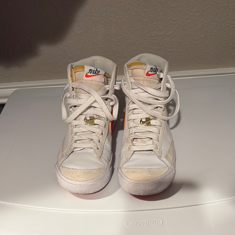 Nike High-Tops in White and Orange Accents